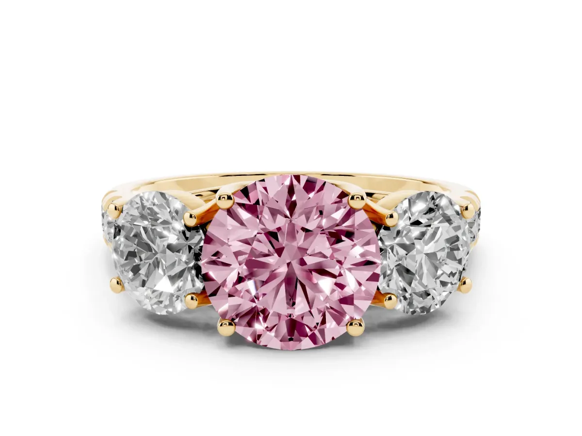 Fancy Pink Round Cut Diamond Three-Stone Ring Set in Yellow gold with Pavé Band