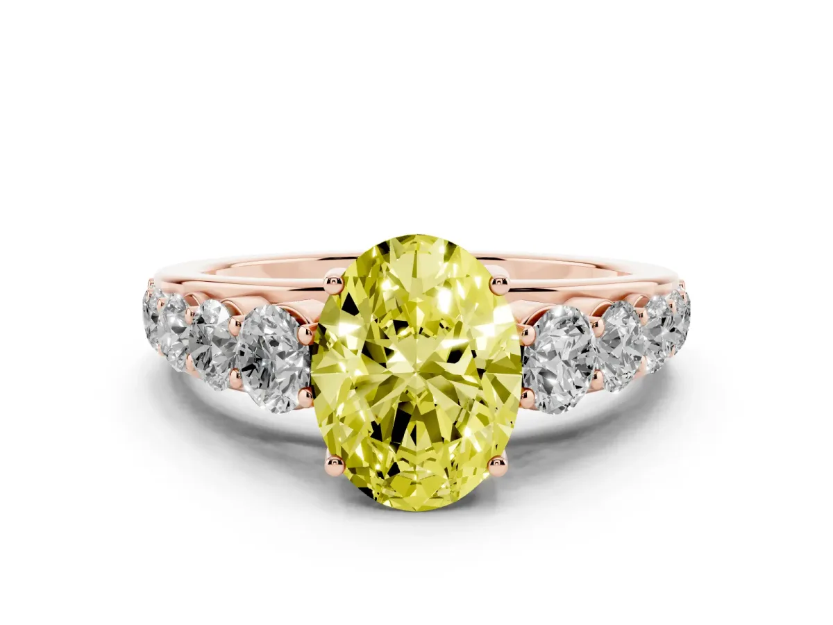 Fancy Yellow Oval Cut Diamond Solitaire Ring Set in Rose gold with Pavé-Set Band and Prong Setting