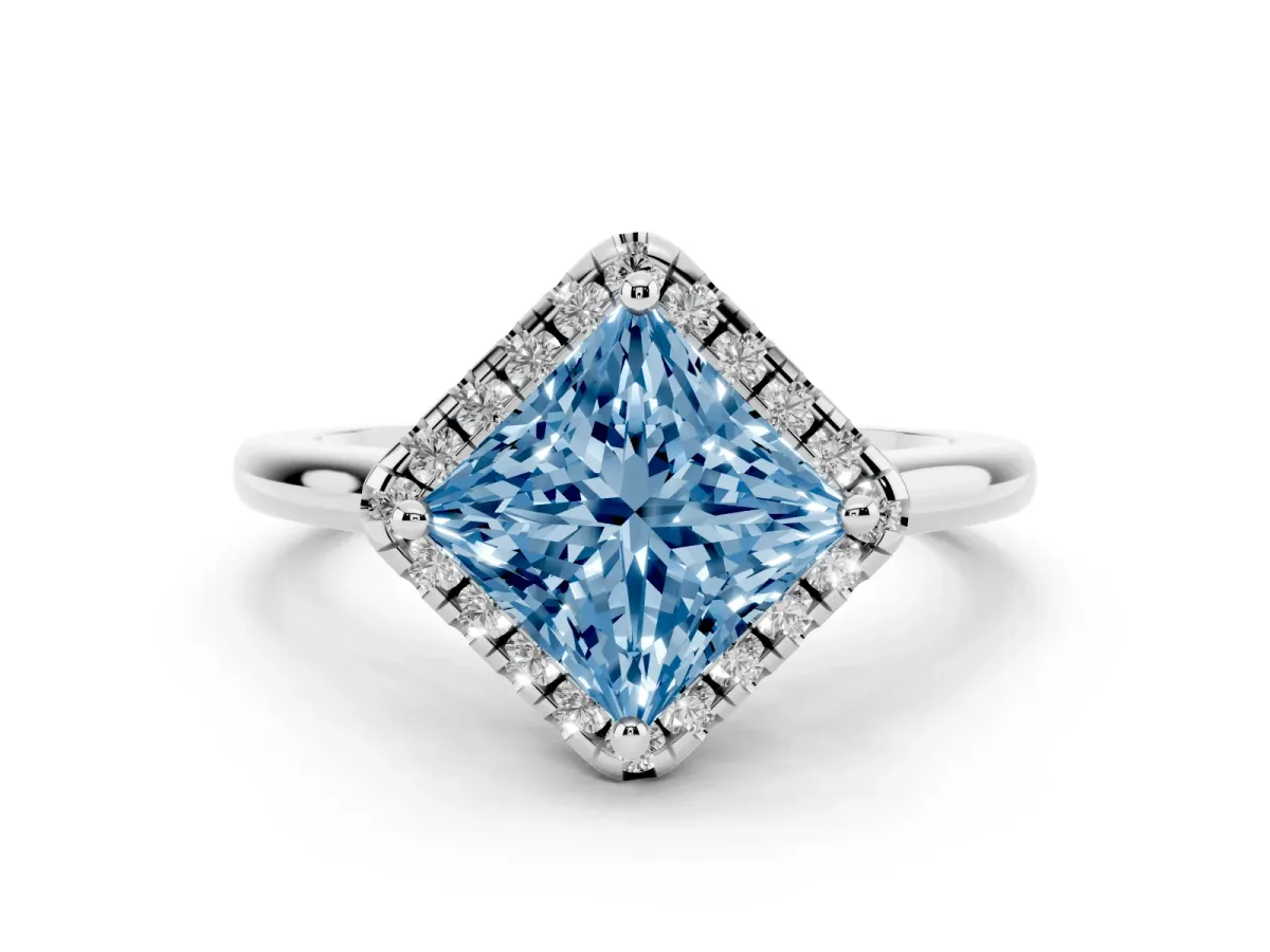 Fancy Blue Princess Cut Diamond Halo Engagement Ring Set in White gold with Pavé Band and Rising Shoulders