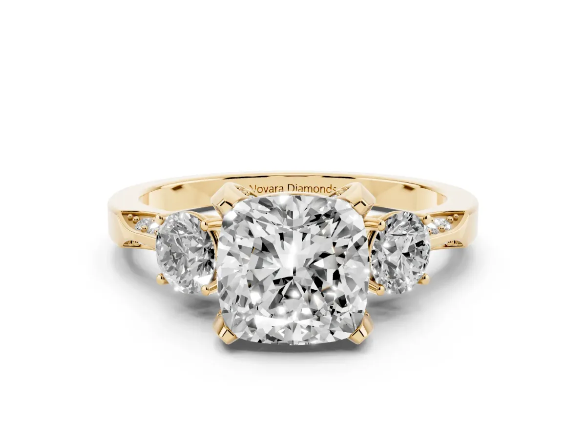 Cushion Cut Diamond Three-Stone Ring Set in Yellow gold with Pavé Band and Smaller Side Stones