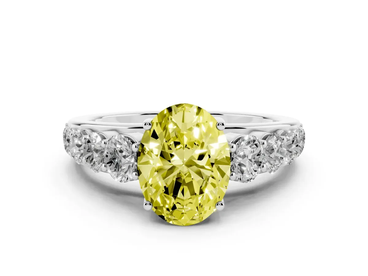 Fancy Yellow Oval Cut Diamond Solitaire Ring Set in Silver with Pavé-Set Band and Prong Setting