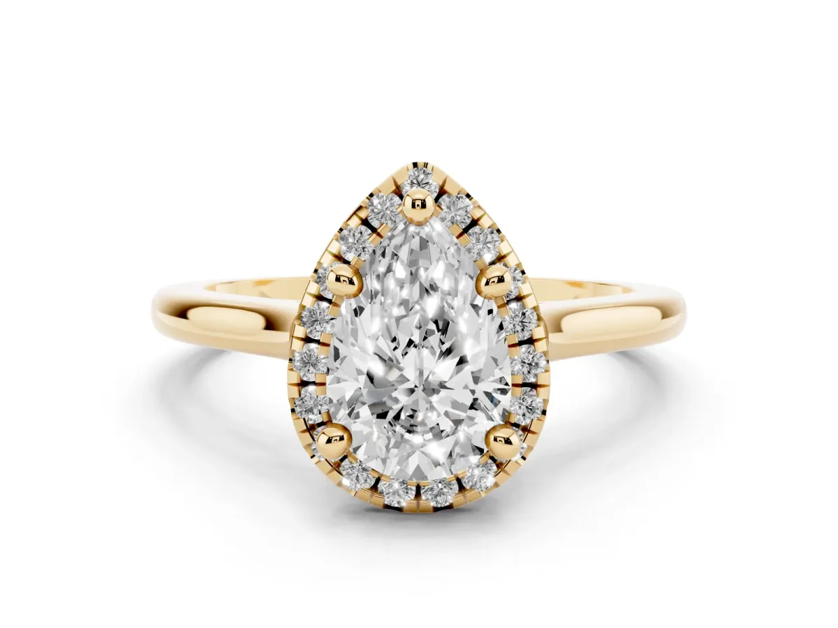 Pear Cut Diamond Halo Engagement Ring Set in Yellow gold with Pavé Band and Rising Shoulders