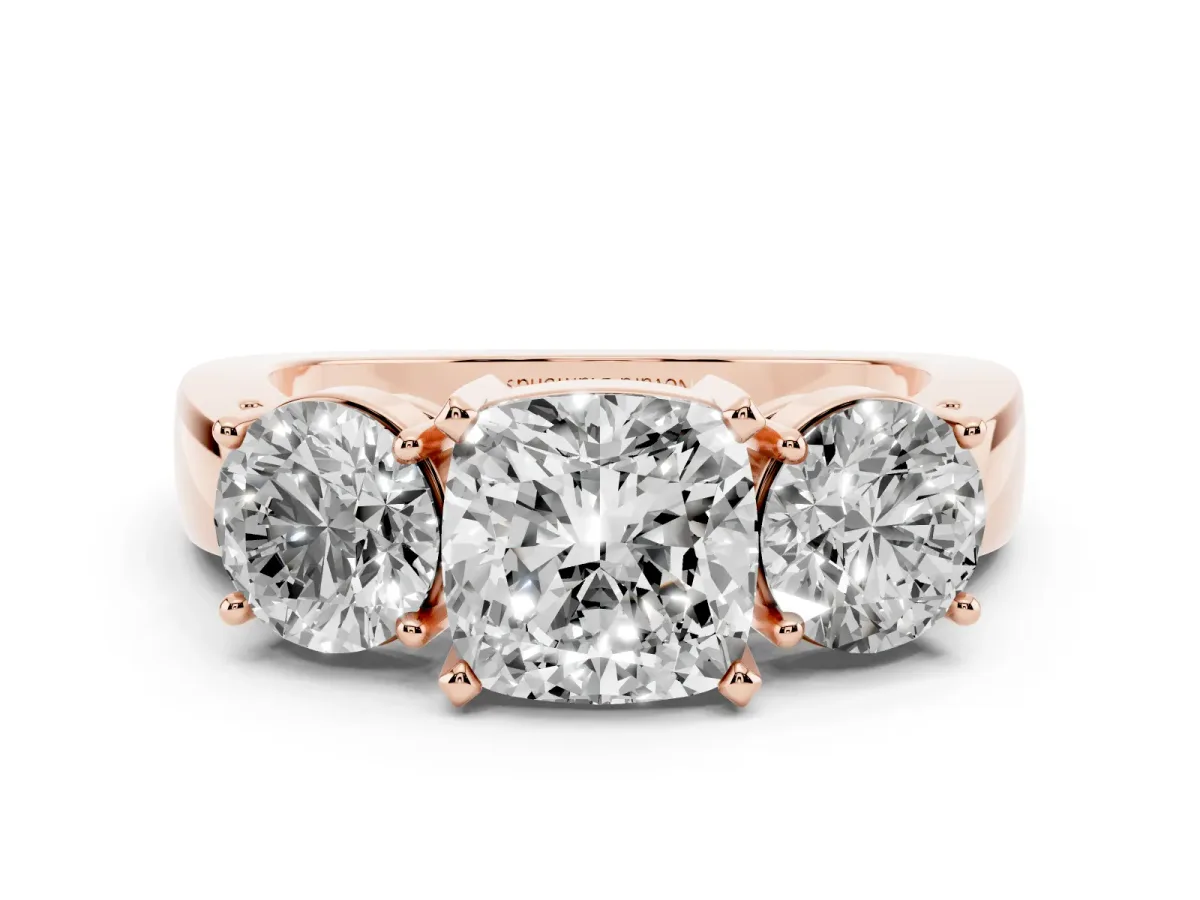 Cushion Cut Diamond Three-Stone Ring Set in Rose gold with Round Side Stones and Classic Band