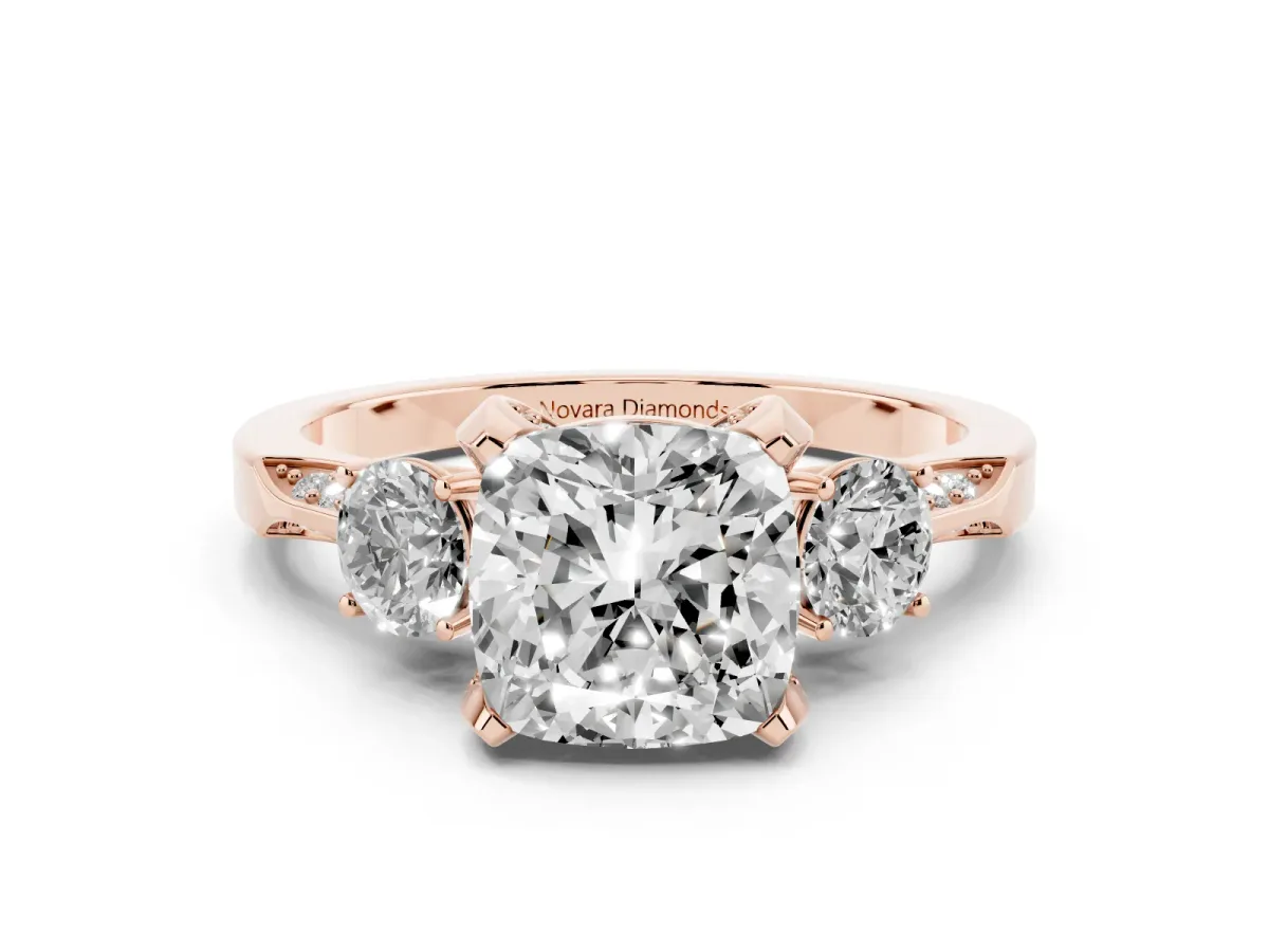 Cushion Cut Diamond Three-Stone Ring Set in Rose gold with Pavé Band and Smaller Side Stones