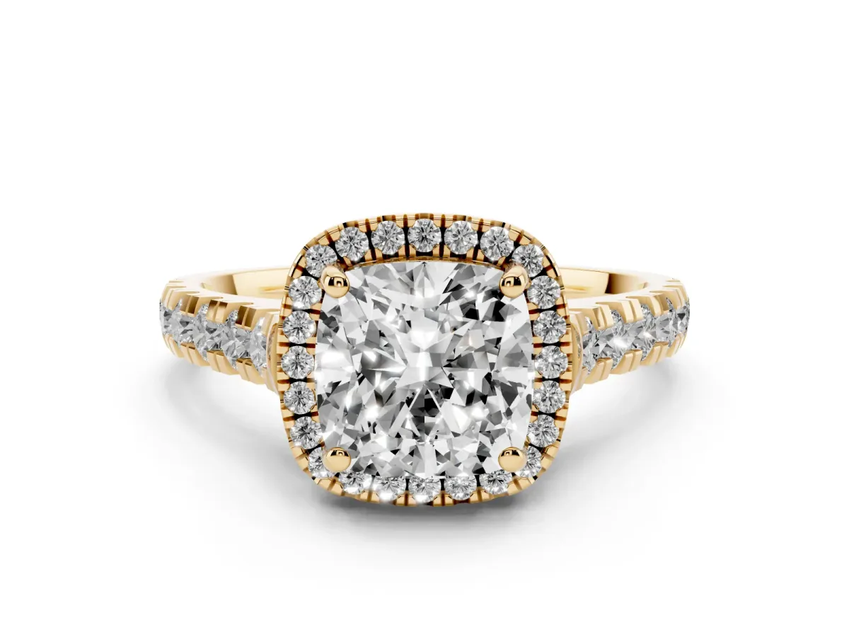 Cushion Cut Diamond Halo Engagement Ring Set in Yellow gold with Pavé Band and Prong-Set Center