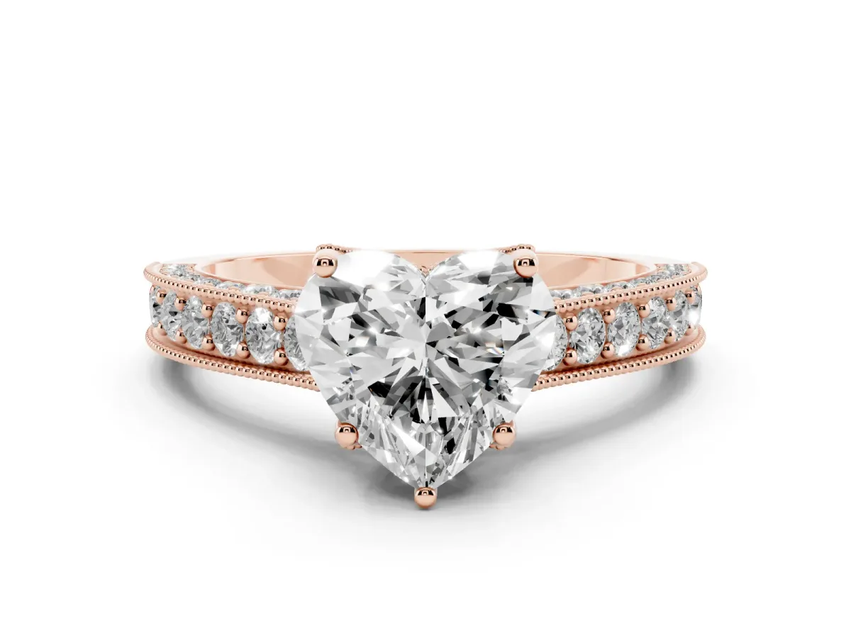 Heart Cut Diamond Solitaire Ring Set in Rose gold with Milgrain-Edged Pavé Band and Prong Setting