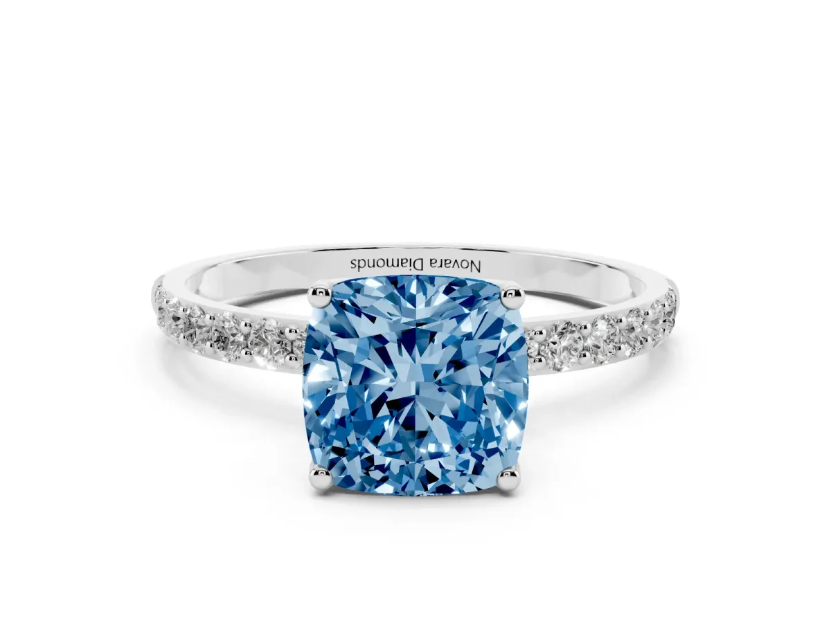 Fancy Blue Cushion Cut Diamond Solitaire Engagement Ring Set in Silver with Round Pavé Band and Prong Setting