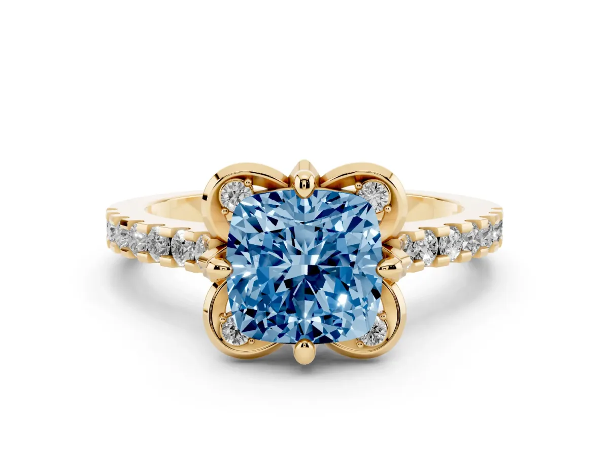 Fancy Blue Cushion Cut Diamond Solitaire Ring Set in Yellow gold with Pavé Band and Floral Prong Setting