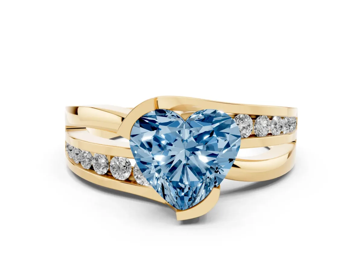 Fancy Blue Heart Cut Diamond Solitaire Ring Set in Yellow gold with Channel Set Split Shank and Tension Prongs