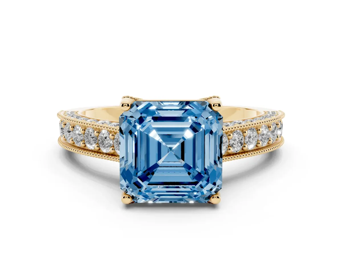 Fancy Blue Asscher Cut Diamond Solitaire Ring Set in Yellow gold with Milgrain-Edged Pavé Band and Prong Setting