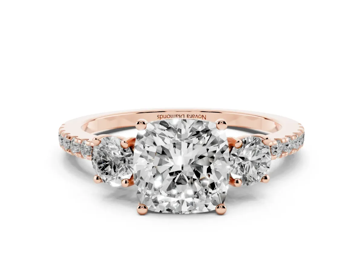 Cushion Cut Diamond Three-Stone Ring Set in Rose gold with Pavé Band and Graduated Sides