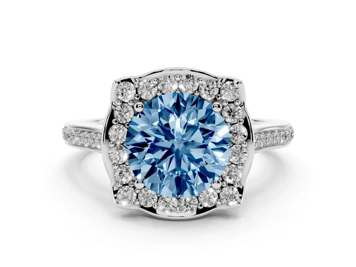Fancy Blue Round Cut Diamond Halo Ring Set in Silver with Pavé-Lined Shoulders and Prong Setting