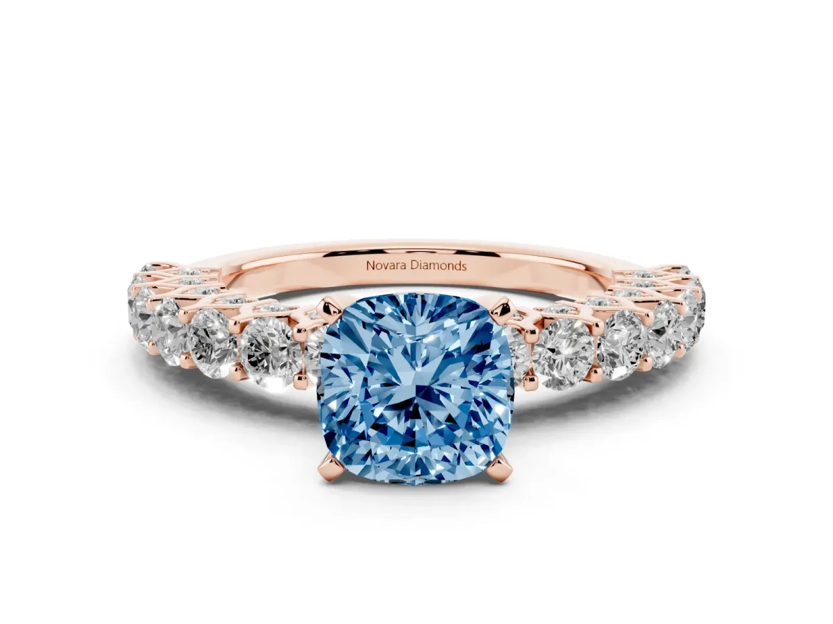 Fancy Blue Cushion Cut Diamond Solitaire Ring Set in Rose gold with Shared Prong Pavé Band
