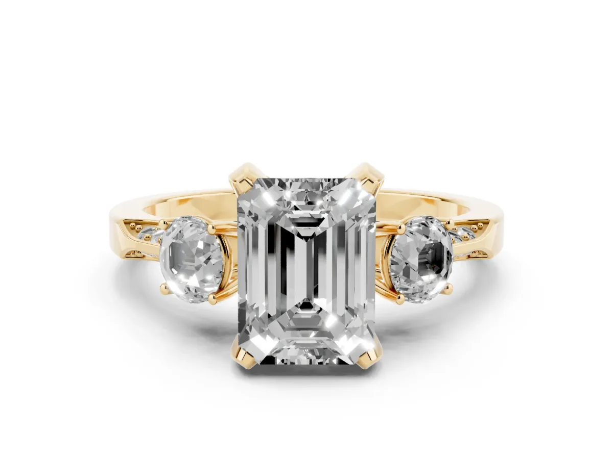 Fancy Yellow Emerald Cut Diamond Three-Stone Ring Set in Yellow gold with Pavé Band and Smaller Side Stones