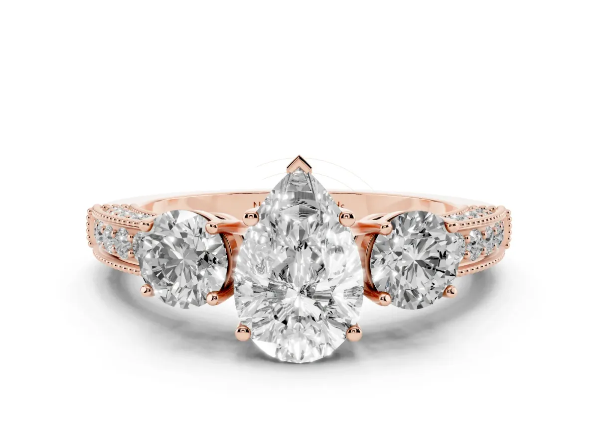 Pear Cut Diamond Three-Stone Ring Set in Rose gold with Round Side Stones and Pavé Band