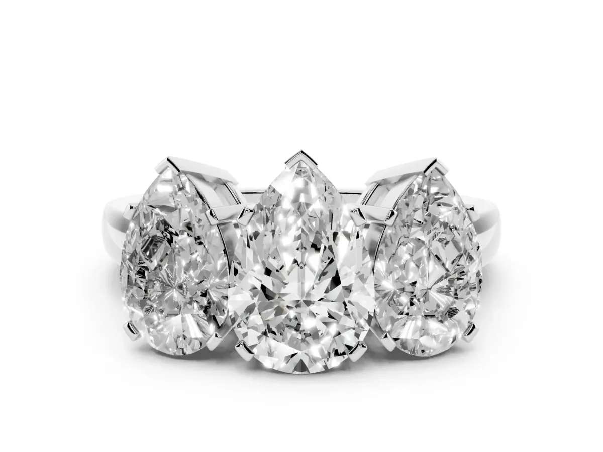Pear Cut Diamond Three-Stone Ring Set in Platinum with Channel-Set Band and Prong Settings