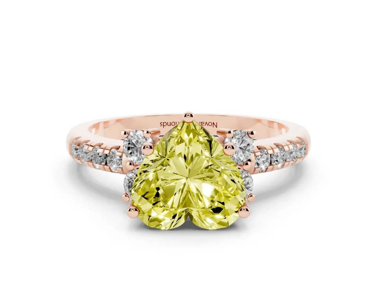 Fancy Yellow Heart Cut Diamond Three-Stone Pavé Ring Set in Rose gold with Prong Setting