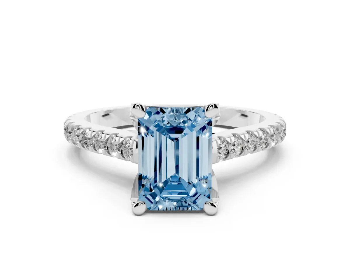 Fancy Blue Emerald Cut Diamond Solitaire Ring Set in White gold with Brilliant Pavé Band and Prong Setting