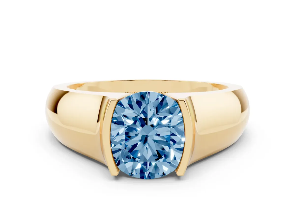 Fancy Blue Round Cut Diamond Bezel Solitaire Ring Set in Yellow gold with Wide Band