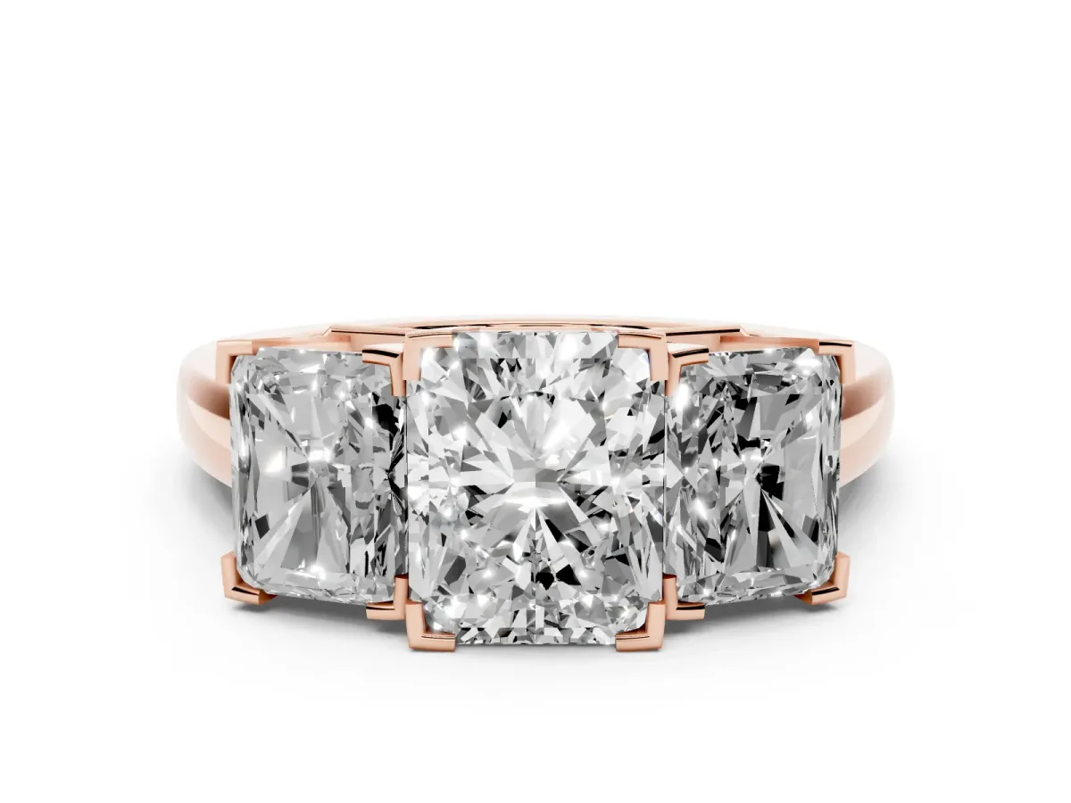 Radiant Cut Diamond Three-Stone Ring Set in Rose gold with Channel-Set Band and Prong Settings