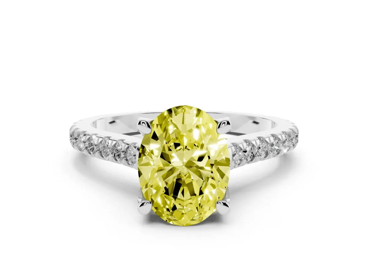 Fancy Yellow Oval Cut Diamond Solitaire Ring Set in White gold with Brilliant Pavé Band and Prong Setting