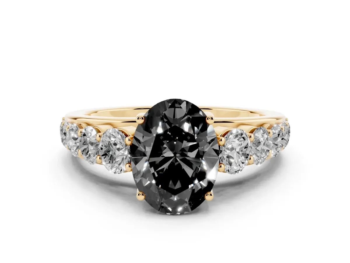 Fancy Black Oval Cut Diamond Solitaire Ring Set in Yellow gold with Pavé-Set Band and Prong Setting