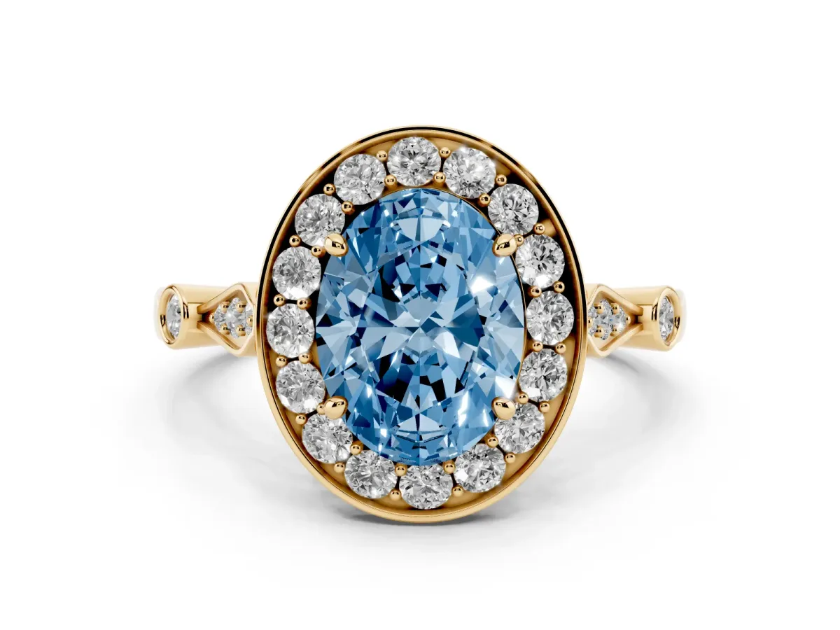 Fancy Blue Oval Cut Diamond Halo Engagement Ring Set in Yellow gold with Twisted Band and Prong Setting