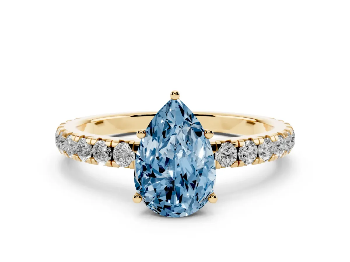 Fancy Blue Pear Cut Diamond Pavé Solitaire Engagement Ring Set in Yellow gold with Prong Setting