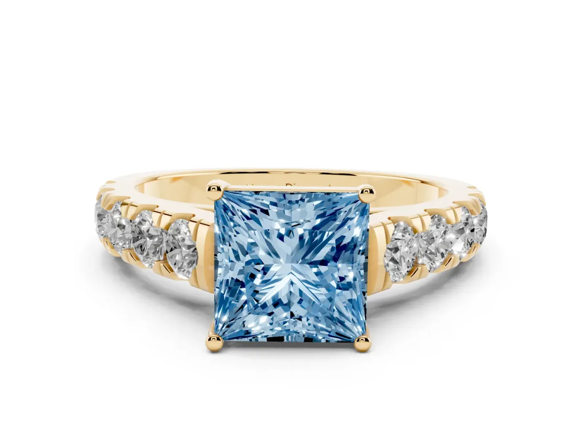 Fancy Blue Princess Cut Diamond Solitaire Ring Set in Yellow gold with Cut-Down Micro Pavé Band and Prong Setting