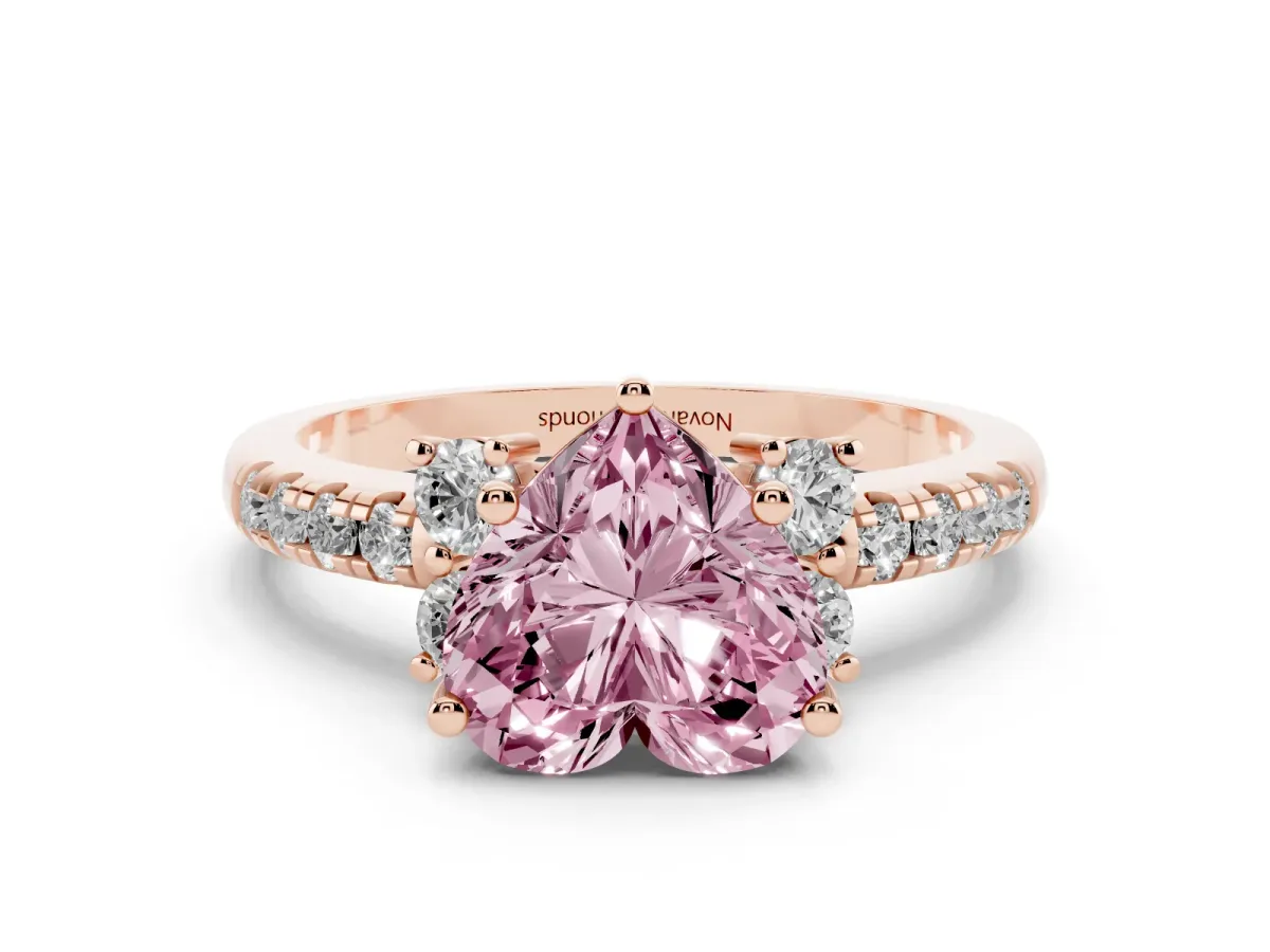 Fancy Pink Heart Cut Diamond Three-Stone Pavé Ring Set in Rose gold with Prong Setting