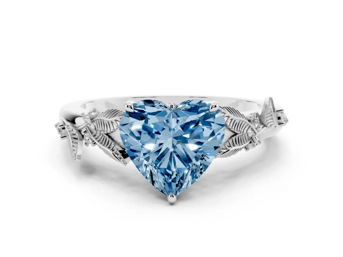 Fancy Blue Heart Cut Diamond Solitaire Ring Set in Platinum with Leaf Motif Band