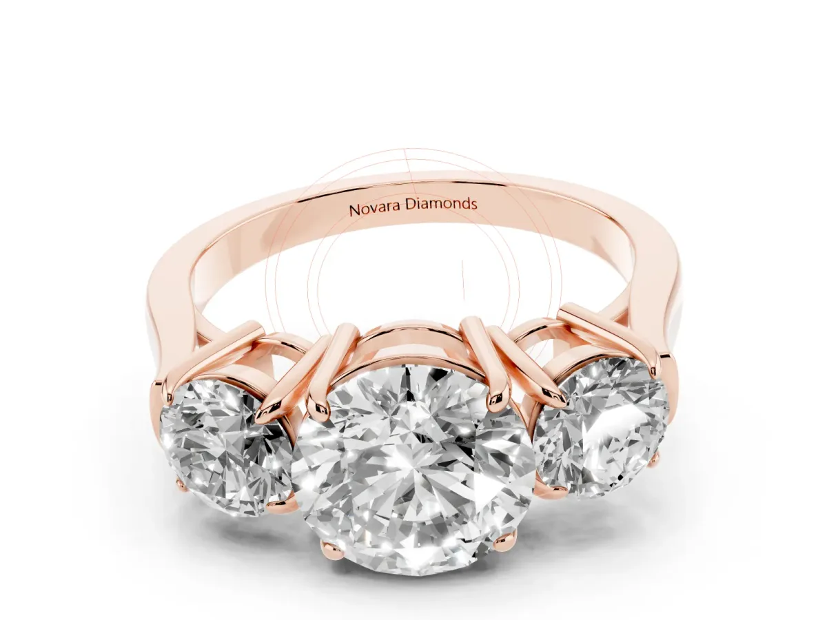 Round Cut Diamond Three-Stone Ring Set in Rose gold with Round Accent Stones and Plain Band