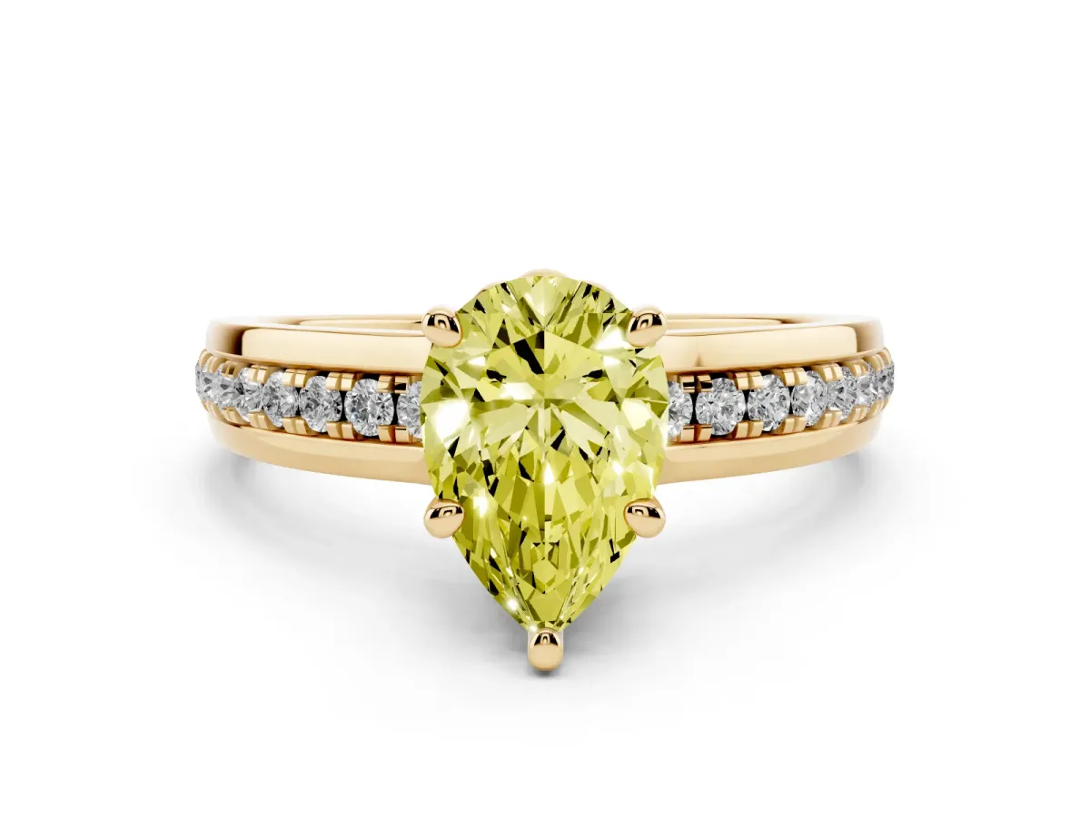 Fancy Yellow Pear Cut Diamond Solitaire Ring Set in Yellow gold with Channel Set Band and Prong Setting