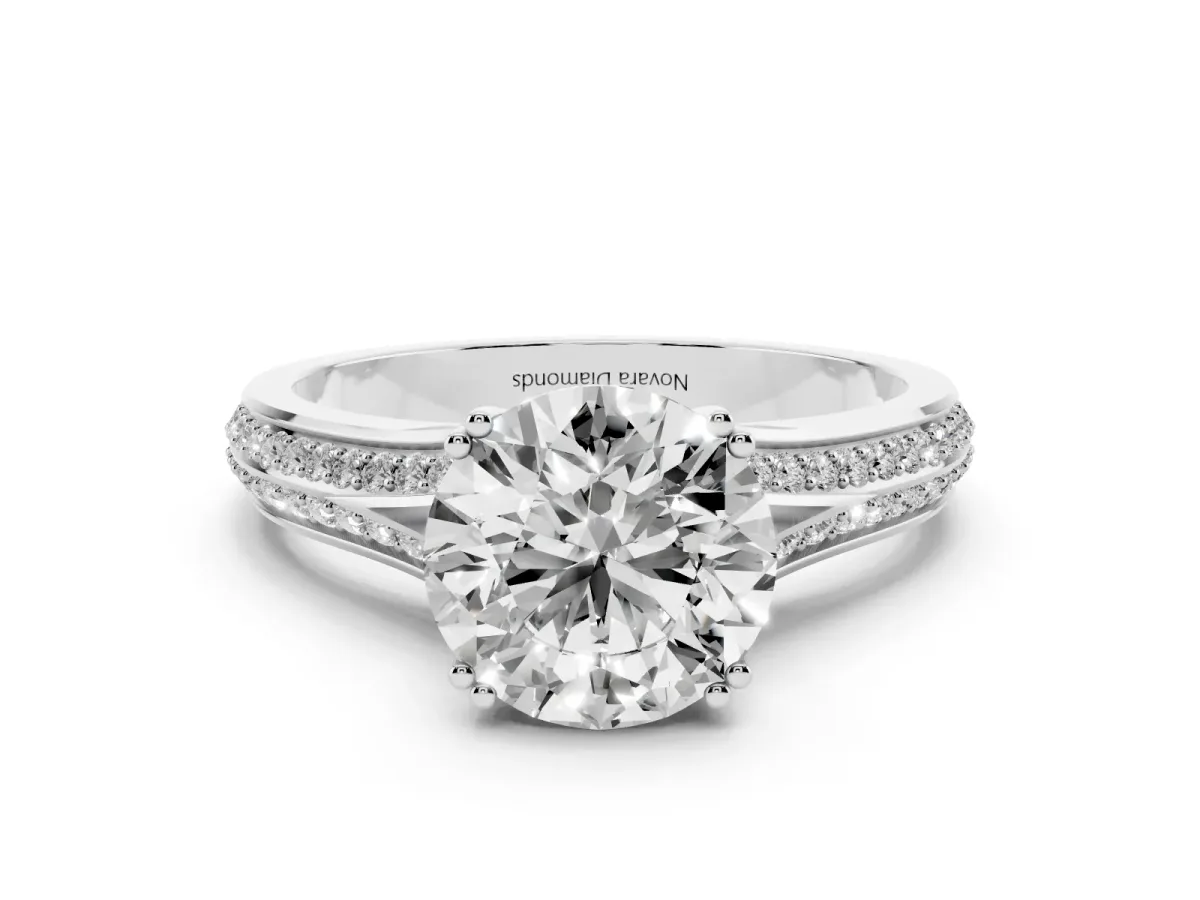 Round Cut Diamond Split Shank Pavé Engagement Ring Set in Silver with Prong-Set Center Stone