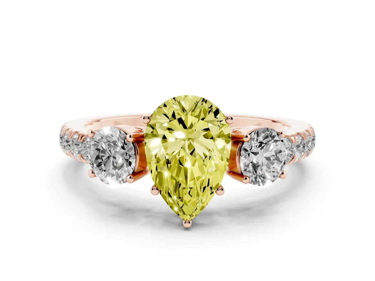 Fancy Yellow Pear Cut Diamond Three-Stone Ring Set in Rose gold with Round Side Stones and Delicate Pavé Band