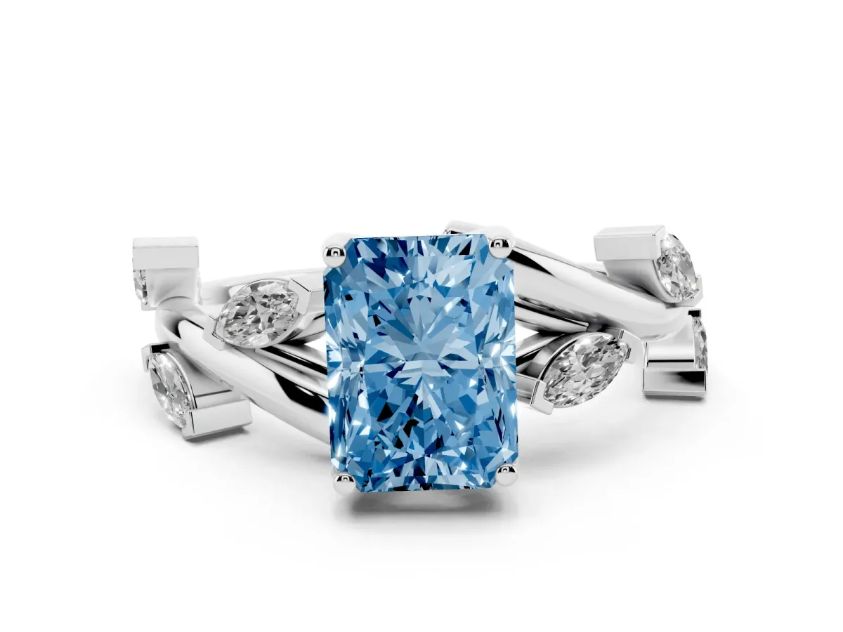 Fancy Blue Radiant Cut Diamond Solitaire Ring Set in Platinum with Twisted Marquise Accent Band