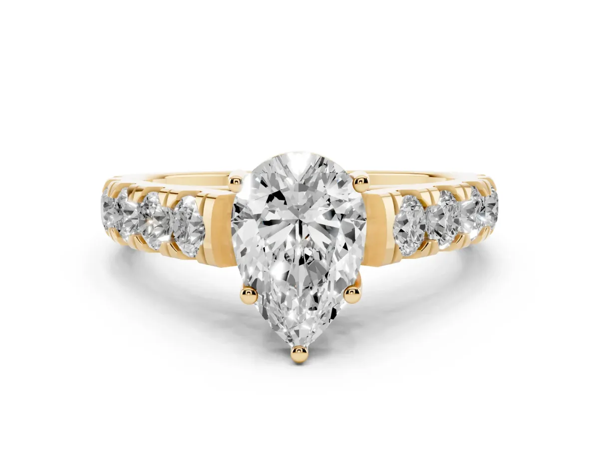 Pear Cut Diamond Solitaire Ring Set in Yellow gold with Cut-Down Micro Pavé Band and Prong Setting