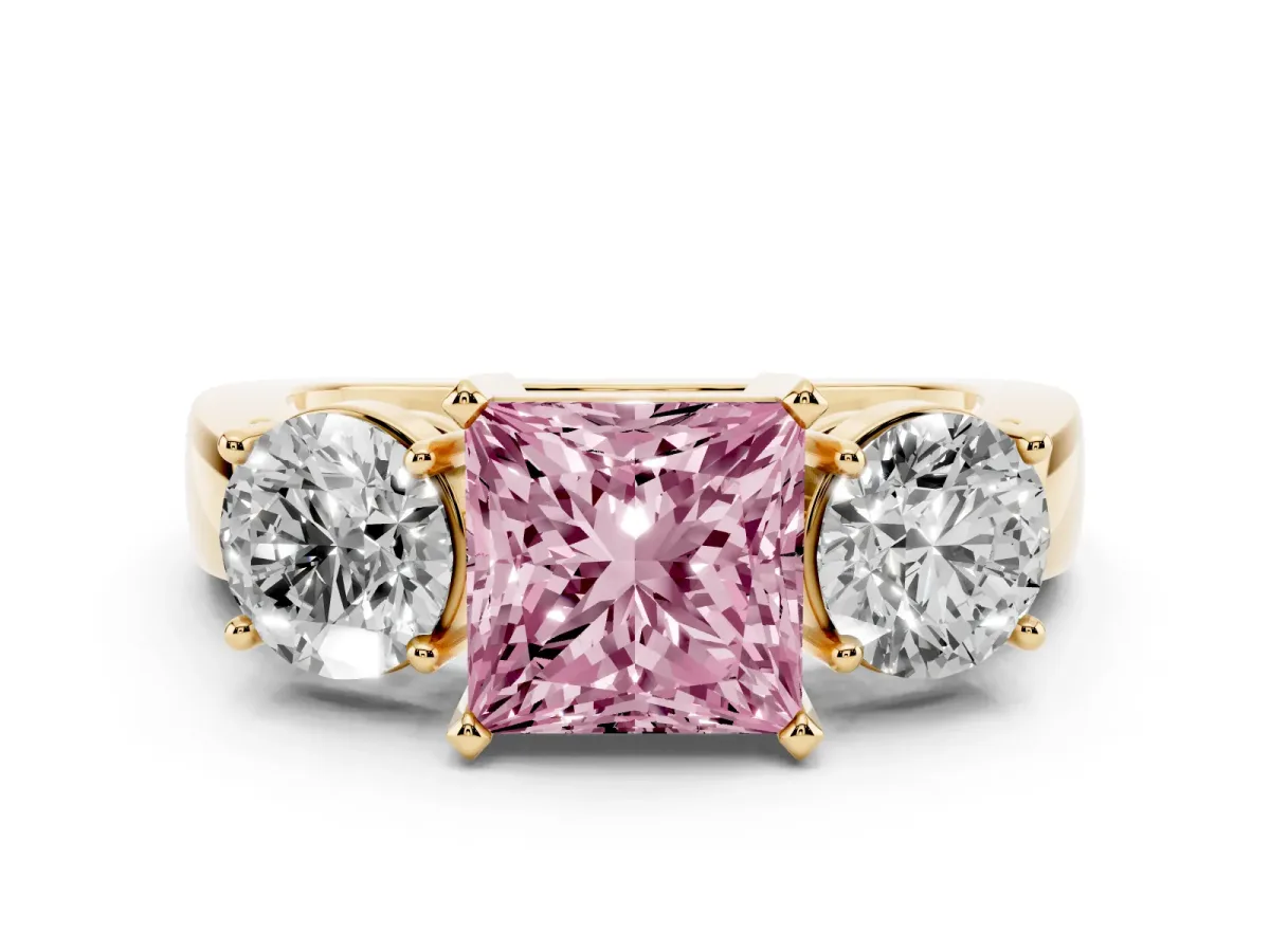 Fancy Pink Princess Cut Diamond Three-Stone Ring Set in Yellow gold with Round Side Stones and Classic Band