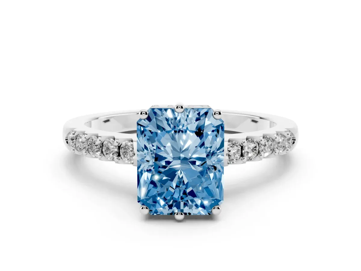 Fancy Blue Radiant Cut Diamond Solitaire Engagement Ring Set in White gold with Pavé Band and Prong Setting