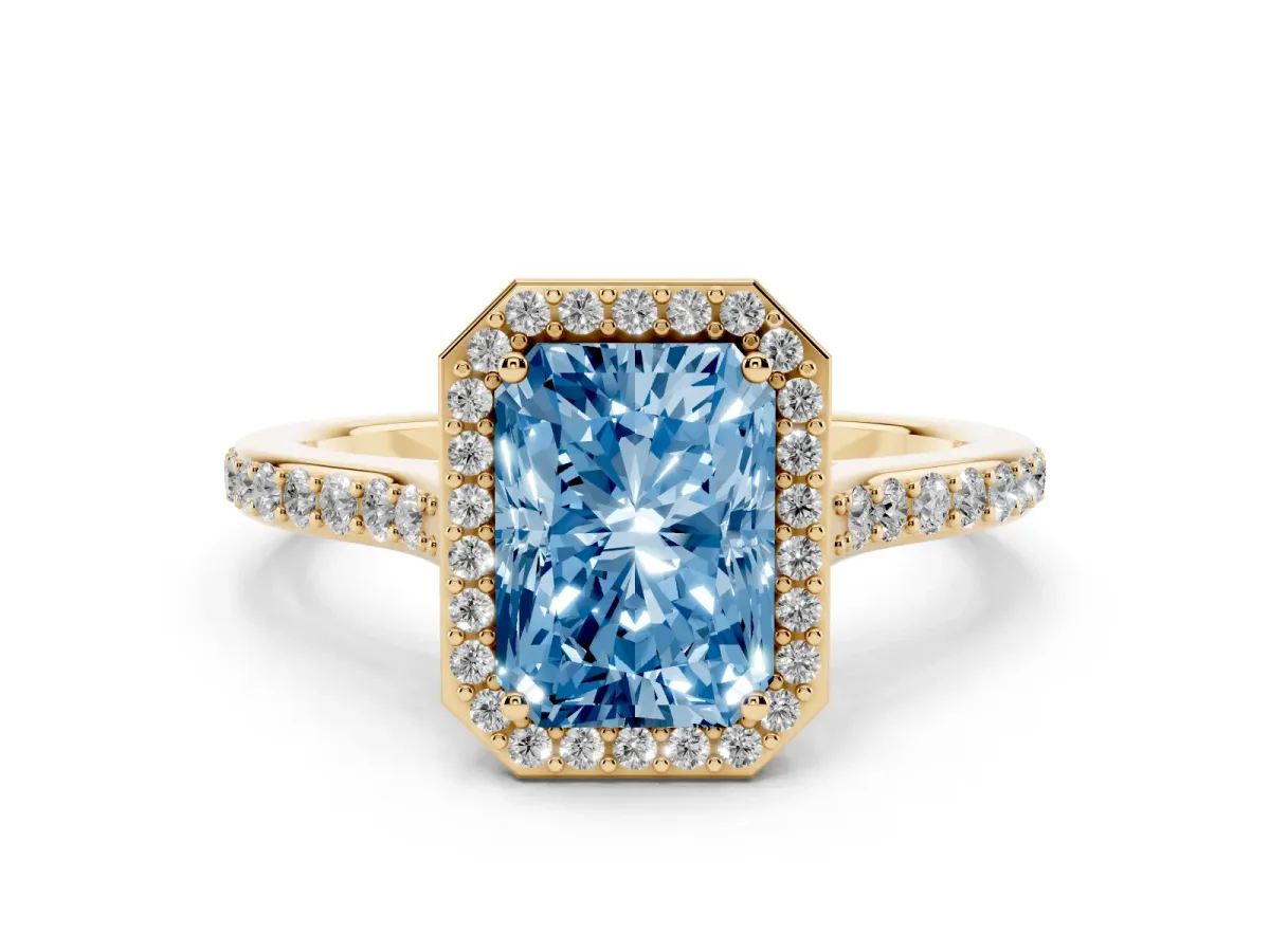 Fancy Blue Radiant Cut Diamond Halo Engagement Ring Set in Yellow gold with Round Pavé Shoulders and Heart Gallery