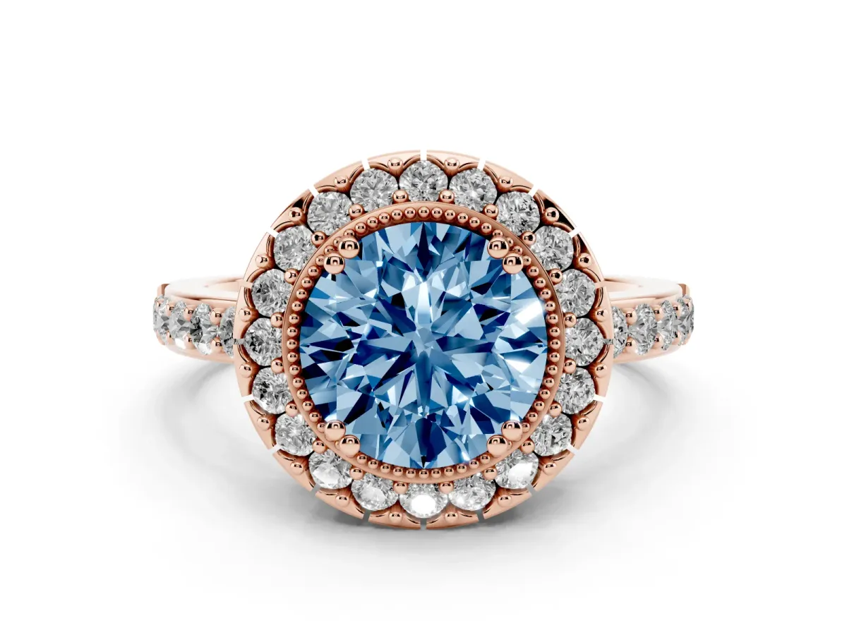 Fancy Blue Round Cut Diamond Halo Ring Set in Rose gold with Pavé Shank and Prong Setting