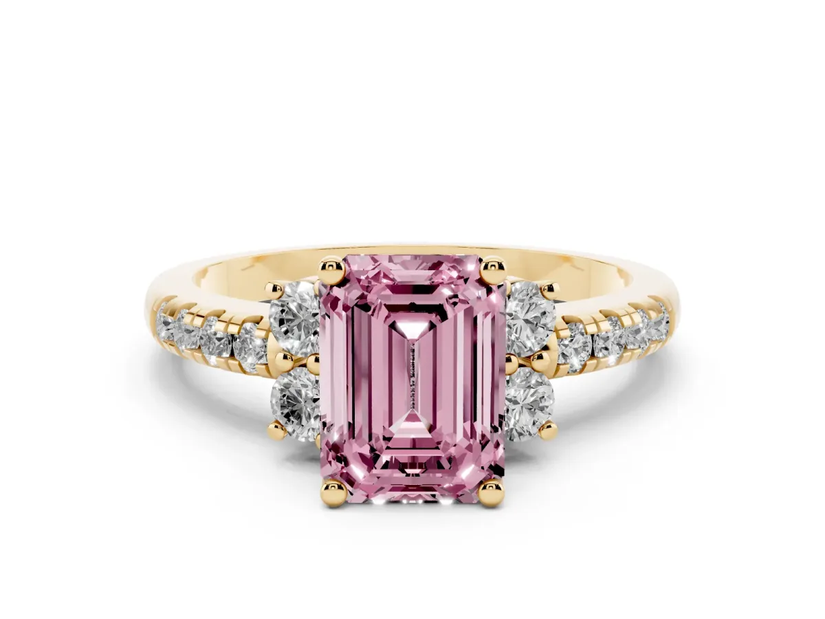 Fancy Pink Emerald Cut Diamond Three-Stone Pavé Ring Set in Yellow gold with Prong Setting