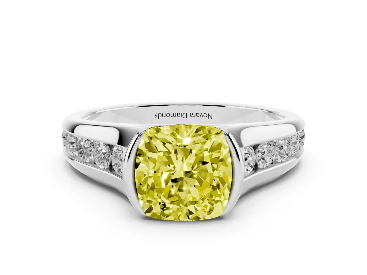 Fancy Yellow Cushion Cut Diamond Bezel-Set Solitaire Ring Set in White gold with Channel-Set Band