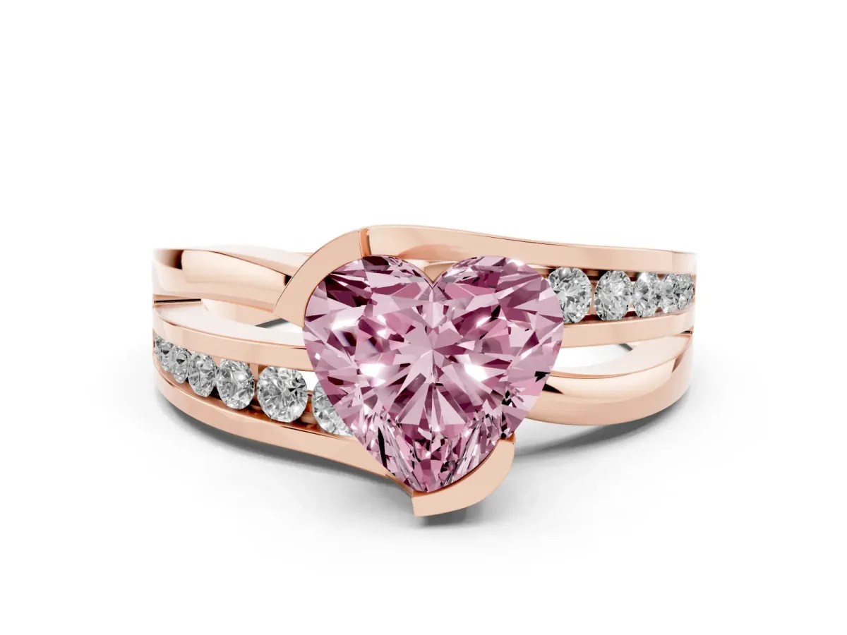 Fancy Pink Heart Cut Diamond Solitaire Ring Set in Rose gold with Channel Set Split Shank and Tension Prongs