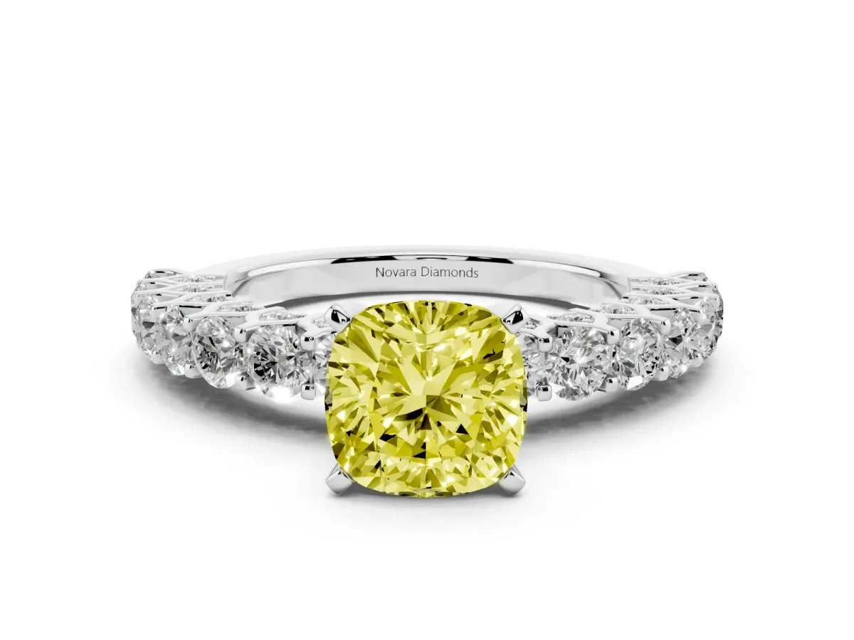 Fancy Yellow Cushion Cut Diamond Solitaire Ring Set in White gold with Shared Prong Pavé Band