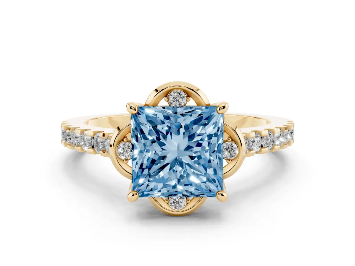 Fancy Blue Princess Cut Diamond Solitaire Ring Set in Yellow gold with Pavé Band and Floral Prong Setting