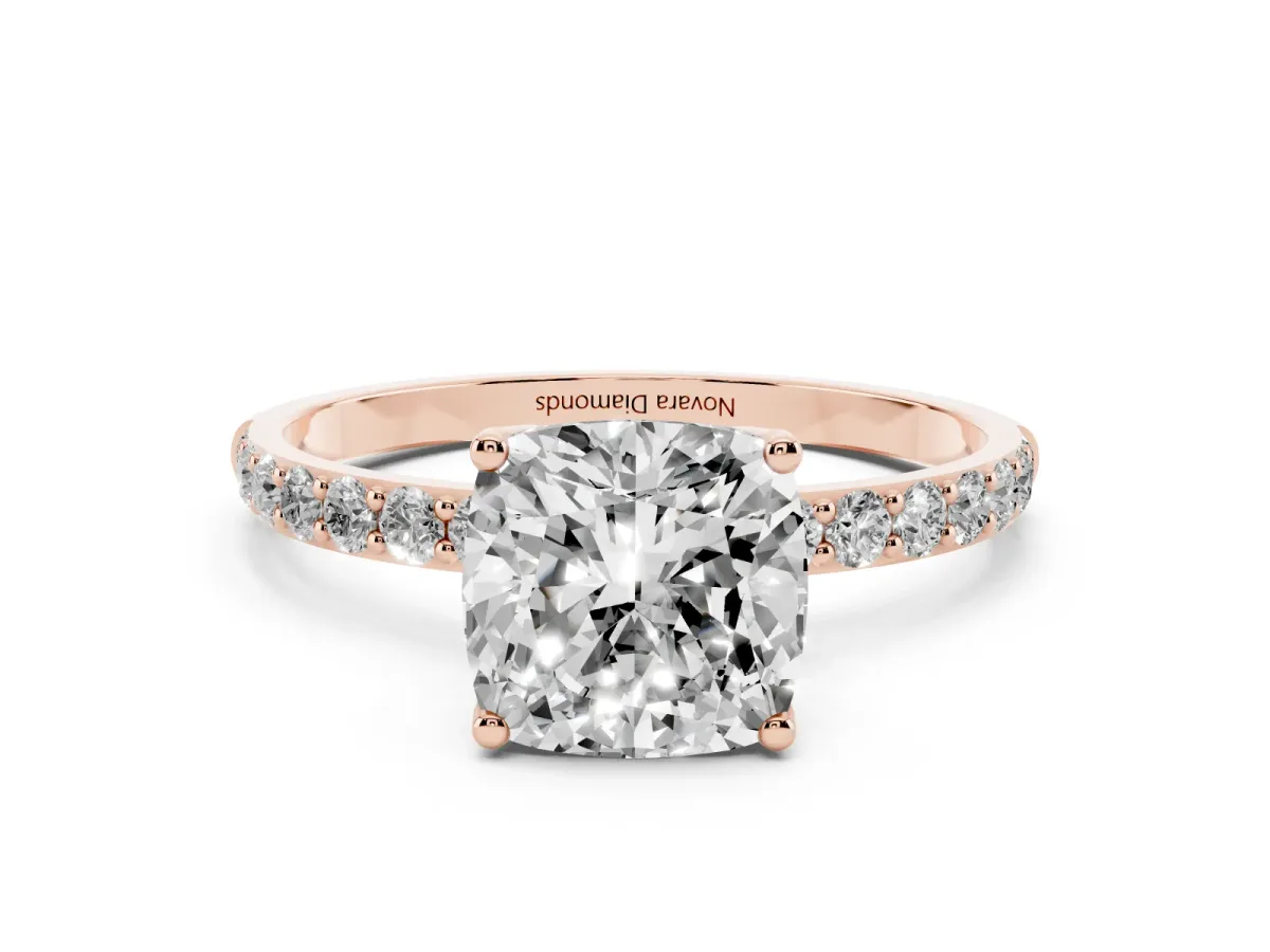 Cushion Cut Diamond Solitaire Engagement Ring Set in Rose gold with Round Pavé Band and Prong Setting