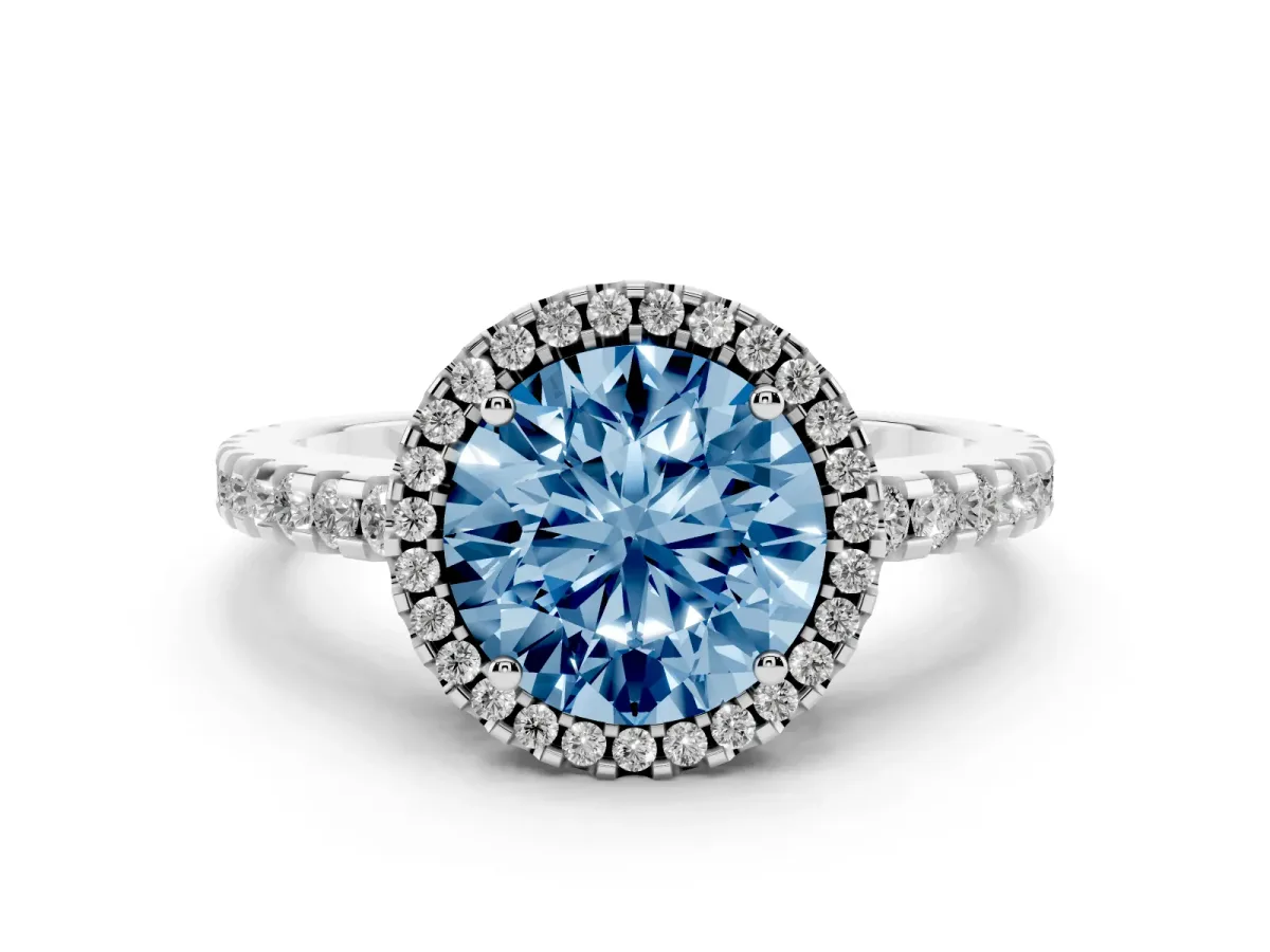 Fancy Blue Round Cut Diamond Halo Ring Set in Silver with Pavé Shoulders and Halo-Framed Center