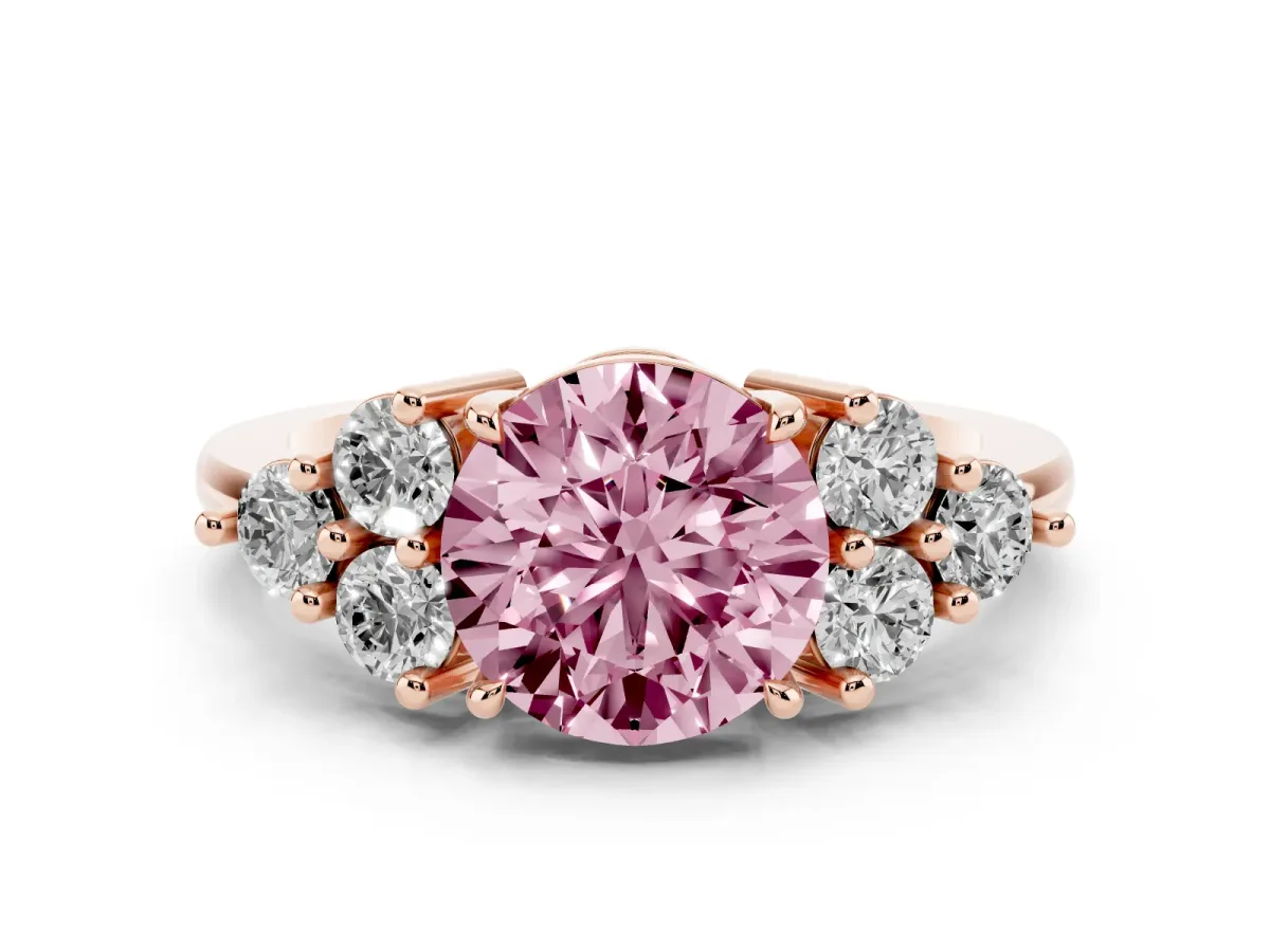 Fancy Pink Round Cut Diamond Solitaire Ring Set in Rose gold with Cluster Accents on Each Side