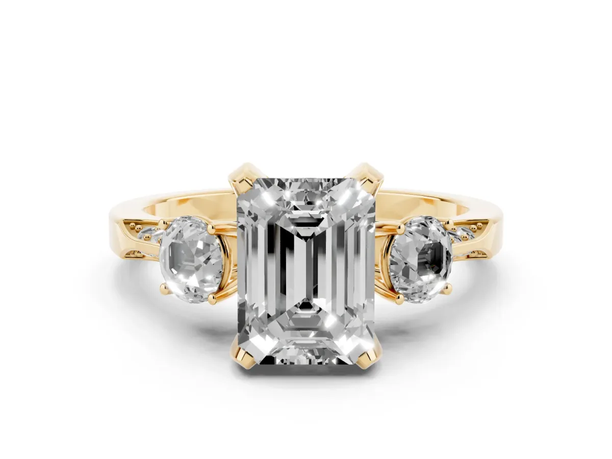 Emerald Cut Diamond Three-Stone Ring Set in Yellow gold with Pavé Band and Smaller Side Stones